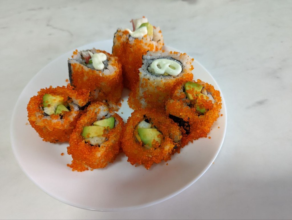 My first attempt at Uramaki — rolling my way through creativity, patience, and lots of tobiko!